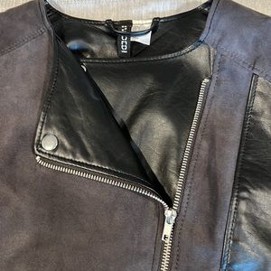 Black H&M suede mixed media short jacket. Size 6.